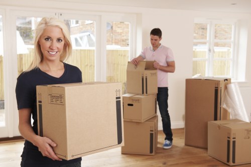Packed office equipment ready for relocation in Hendon