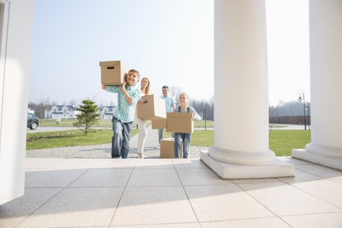 Home moving team working in a Hendon residential street
