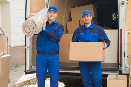 Packing boxes and furniture ready for a local van removal