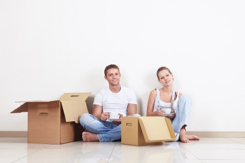 Packed boxes and furniture ready for loading during a Hendon move