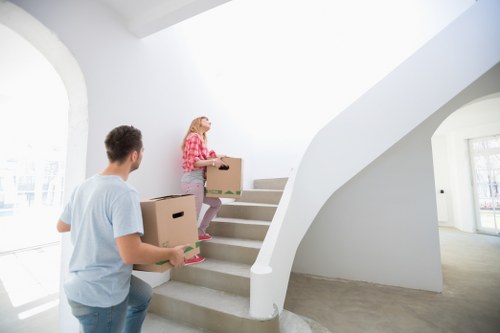 Packed office boxes and furniture ready for relocation