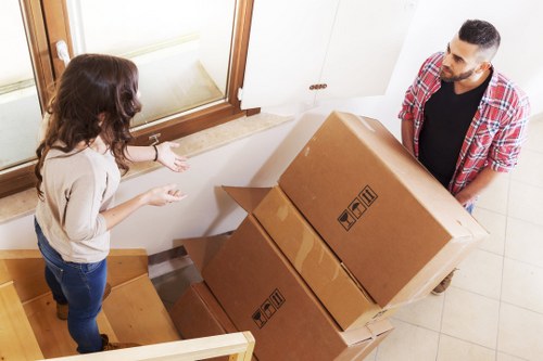 Moving van and boxes for a local relocation in Hendon