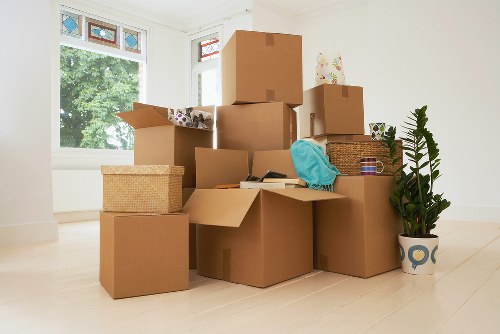 Careful unpacking and box organisation in a Hendon property