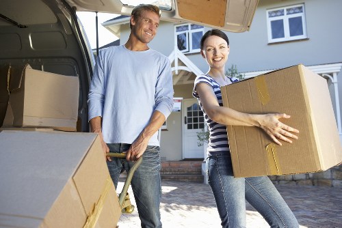 A careful relocation team handling apartment access in Hendon